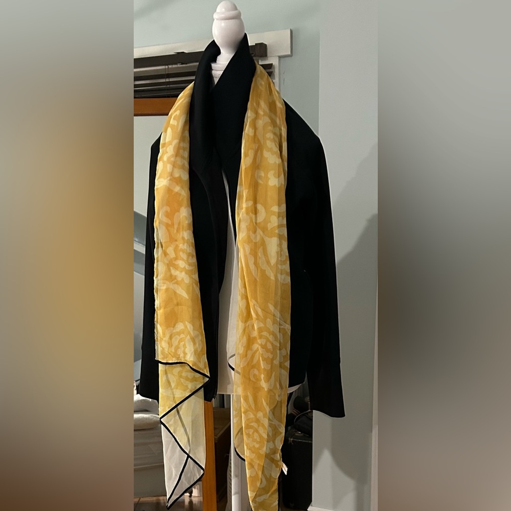 Yellow scarf with black trim